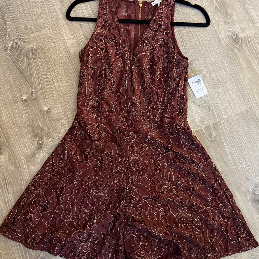 Size small Charlotte Russe dress/romper. Maroon with gold details.